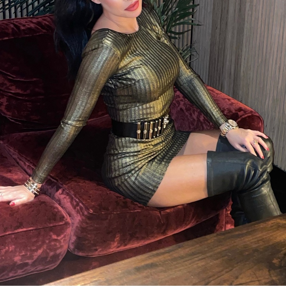 Black and gold mini dress low in the back to the bra